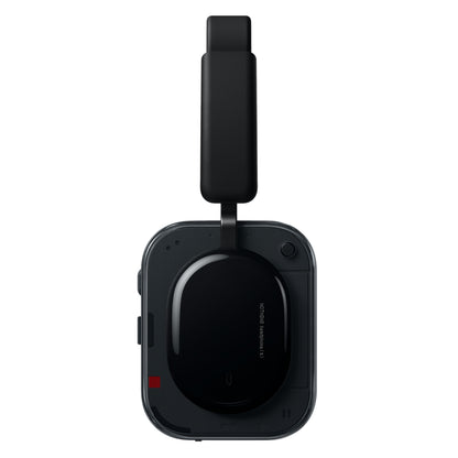 Nothing Headphone (a) sort trådløs over-ear hovedtelefon med synlig ørekop, polstret bøjle og aktiv støjreduktion, sideview.