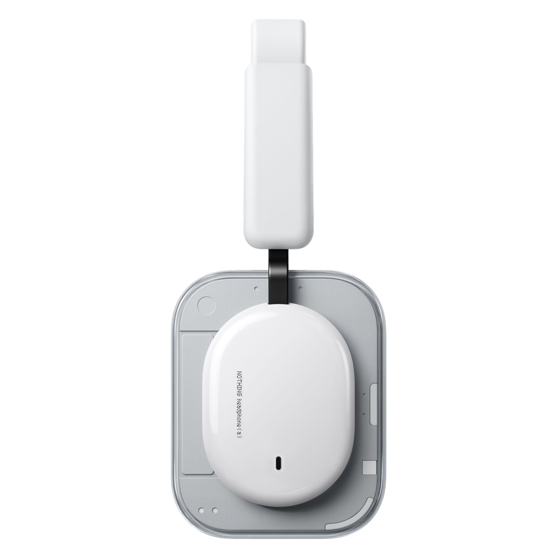 Nothing Headphone (a) trådløse over-ear høretelefoner i hvidt etui på grå opladningspad med hvid, lodret arm og sort kabel.