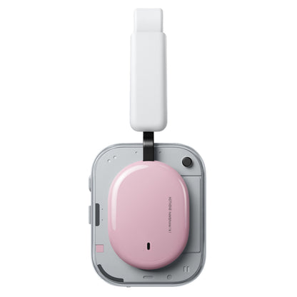 Nothing Headphone (a) trådløse over-ear høretelefoner, rosa, hvidt greb på grå base med blankt pink ovalt låg.