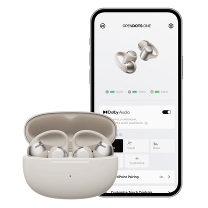 Shokz OpenDots One trådløse åbne clip-on-hovedtelefoner i åben opladningsetui med smartphone lyd-app.