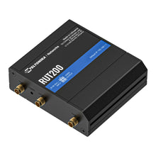 Teltonika RUT200 4G-router, sort, tre antenneporte, flere mærkede forbindelser, blå label øverst.