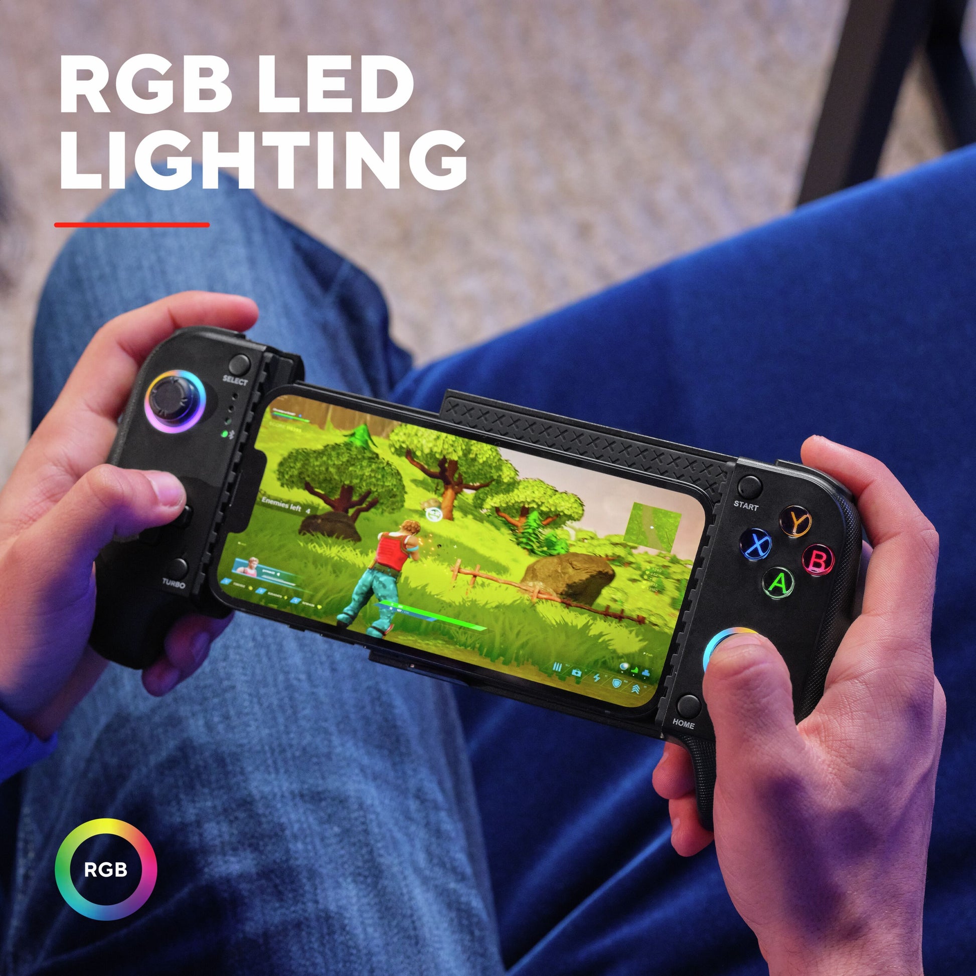 Trust GXT 735 Mylox trådløs mobil håndkontrol monteret på smartphone, med "RGB LED LIGHTING" tekst og RGB hjul ikon.