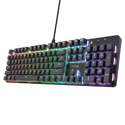 Trust GXT 871 Zora mekanisk gamingtastatur med RGB-belysning, Huano-switches, numerisk tastatur og "GXT Trust" over piletaster.