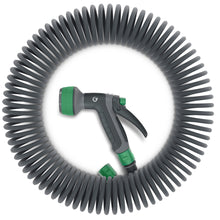 Grimsholm spirallange 15 m rullet sammen med Grimsholm spraypistol placeret i midten.