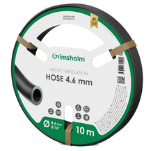 Grimsholm mikroslange 4,6 mm, 10 meter, grøn og hvid label med produktinfo, ikoner og 3 års garanti.