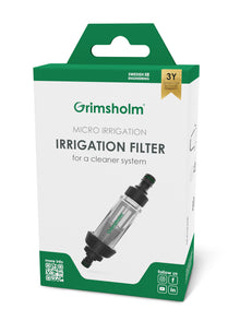 Grimsholm Mikrovandingsfilter i grøn/hvid æske med Grimsholm-logo, 3 års garanti og synlige sociale medie ikoner.