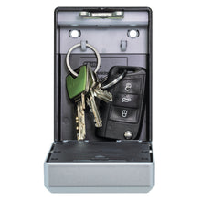 Abus KeyGarage 787 nøgleskab med Bluetooth, åben med husnøgler og bilnøglebrik synlige indeni.