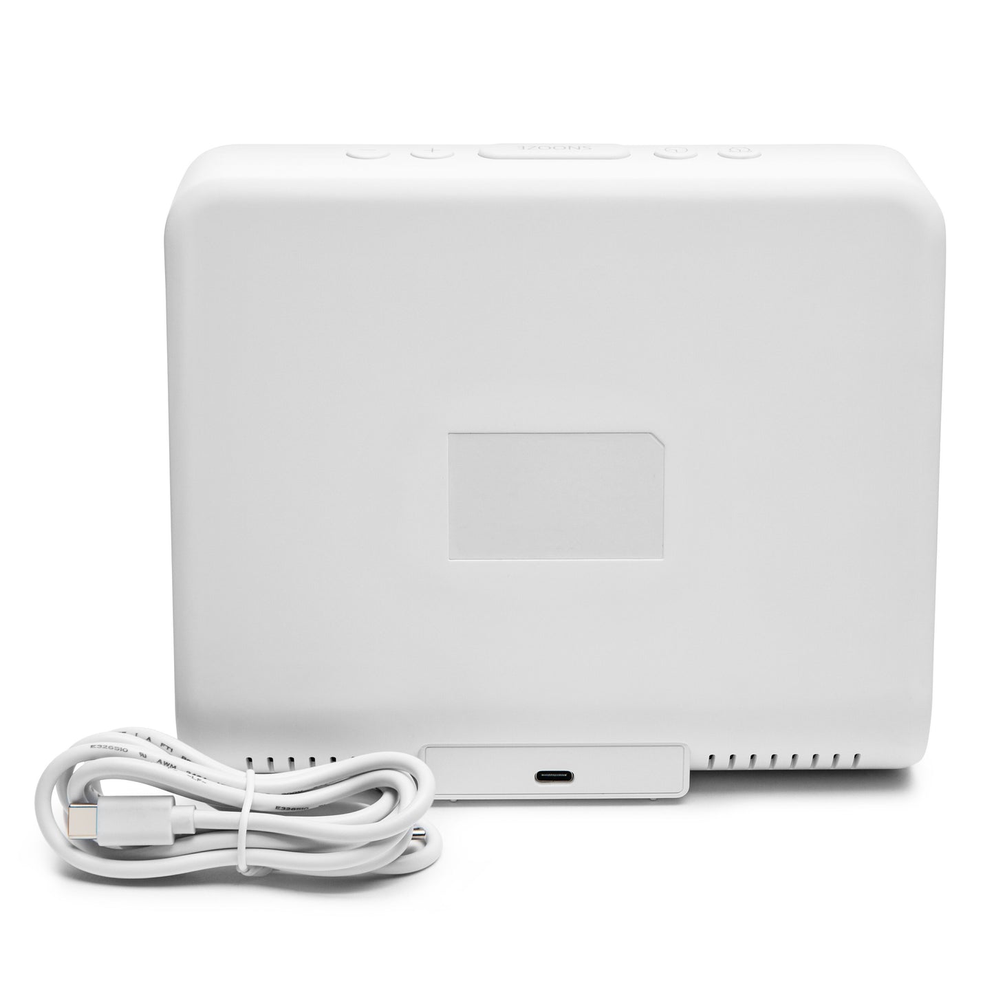 Rubicson vækkeur med trådløs opladning, bagfra med blankt mærkefelt, USB-C-port og hvidt USB-kabel ved siden af.