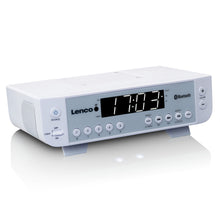 Lenco KCR-100 hvid digital Bluetooth FM-radio med stor LED-skærm, mærkede knapper, lydstyrkehjul og lyskontrol.