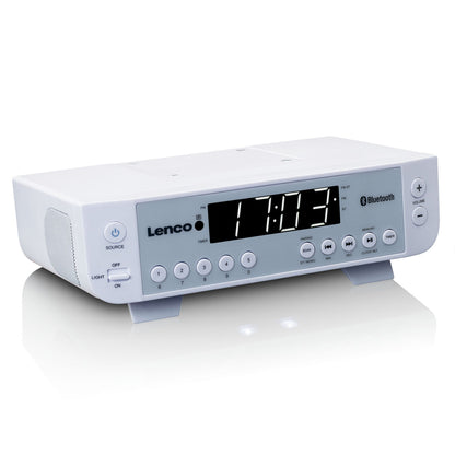 Lenco KCR-100 hvid digital Bluetooth FM-radio med stor LED-skærm, mærkede knapper, lydstyrkehjul og lyskontrol.