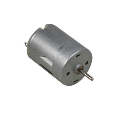 DC-motor 2,5-6 V cylinderformet med metalhus, synlig aksel og to terminaler.