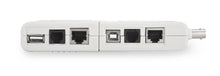 Kabeltester til computerkabler, hvid med USB-, Ethernet-, telefon- og coax-stik i række, identificerer stiktyper.