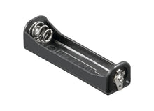 Batteriholder til AAA i sort plast med metal fjeder- og fladkontakt.