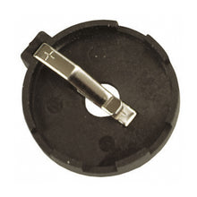 Luxorparts batteriholder til CR2032, rund sort plast med central metalclip til knapcellebatteri på kredsløbskort.