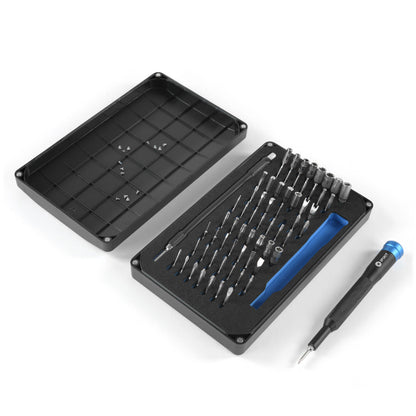 Ifixit Mako Præcisionsmejsel med bits, sort etui, forskellige bits, blå pry-værktøj, sort håndtag.