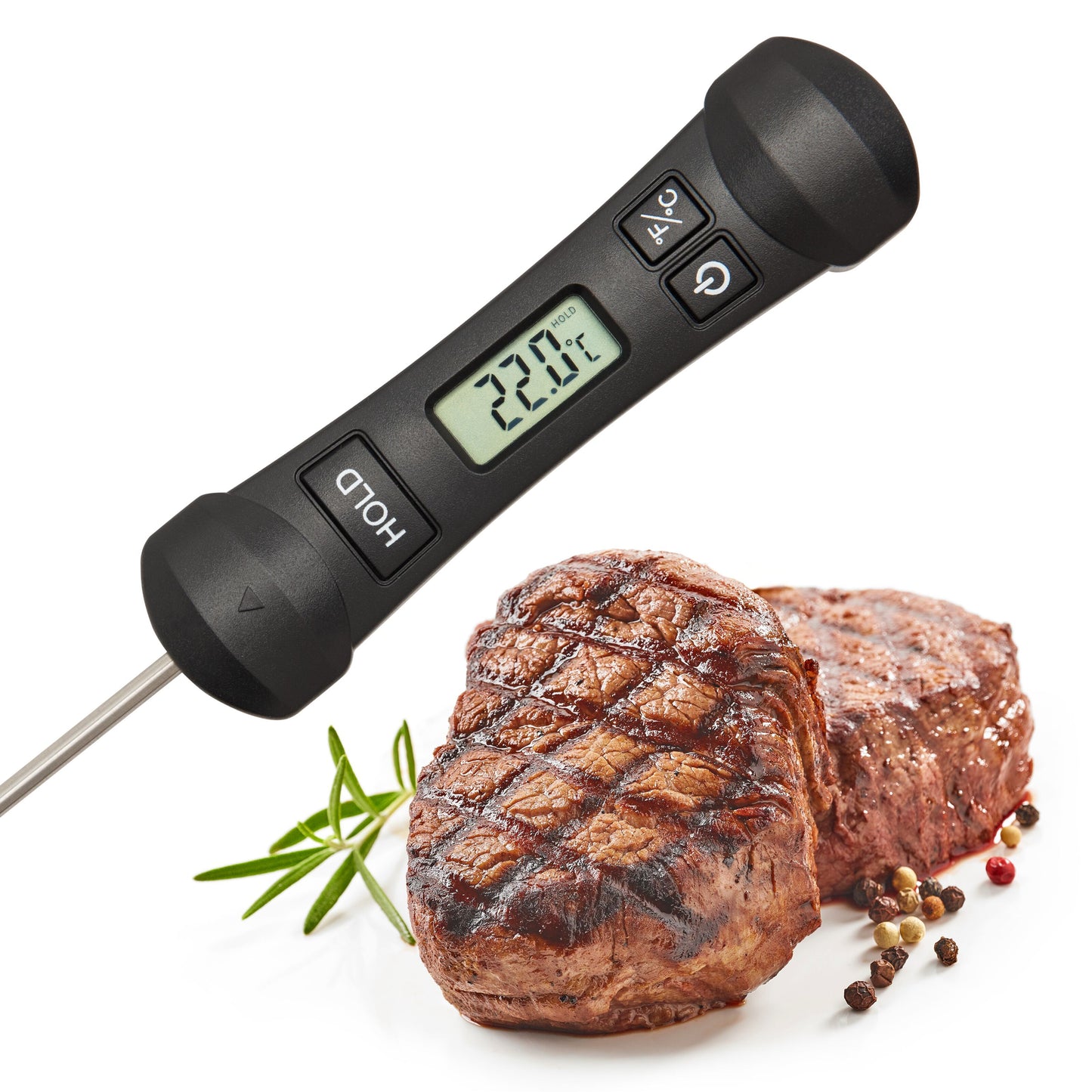 Rubicson Digital køkkentermometer foldbar viser 22,0°C ved to stegte bøffer med rosmarin og peberkorn.