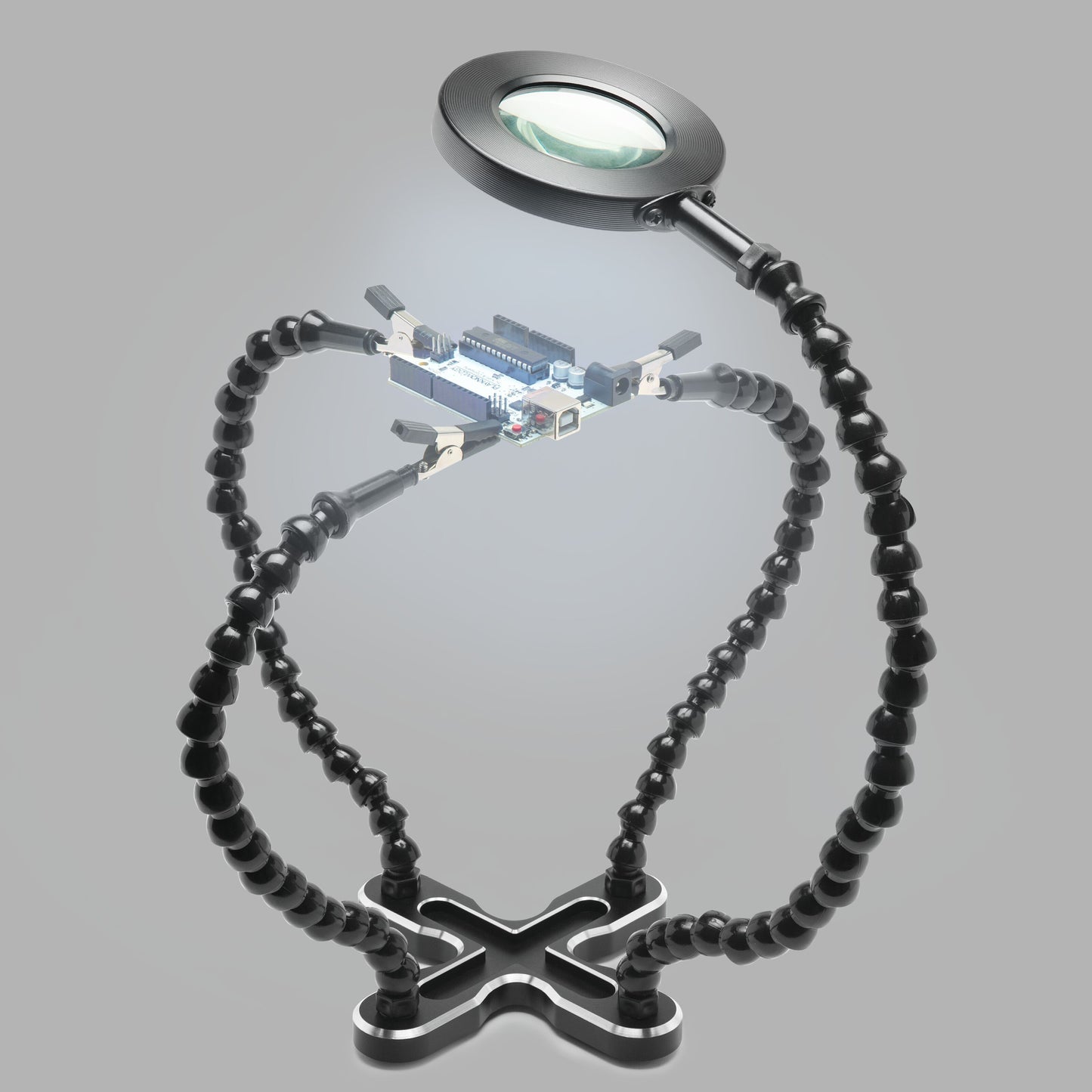 Luxorparts stativ til præcisionsarbejde med justerbare arme, clips og lup holder printplade.