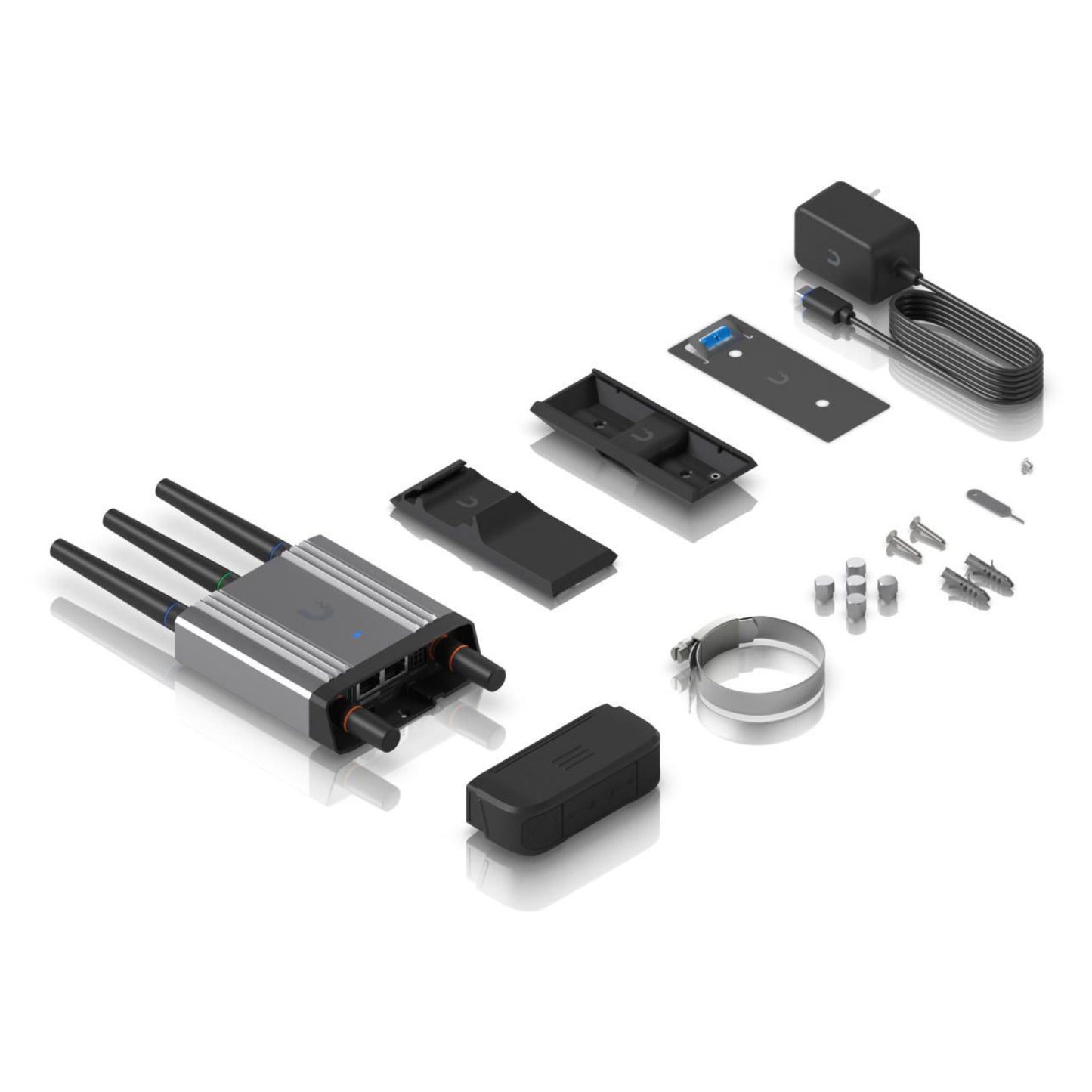 Ubiquiti UMR-INDUSTRIAL-EU 4G-router med modem, tre antenner, strømforsyning, monteringsbeslag og installationssæt.
