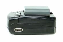Jupio kamerabatteri oplader sort med gråt batteri isat, USB-port i siden, til Li-ion digitalkamera batterier.