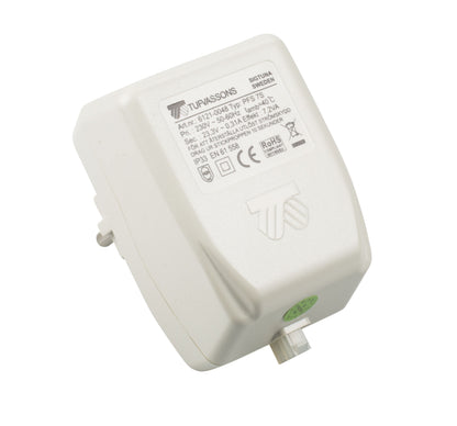 Tufvassons netadapter AC 12 V 7,2 W med produktinfo og certifikat-logoer synligt på toppen, viser spænding og strøm.