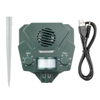 Ultralydsforstyrrelse til dyr grøn med solcellepanel, to drejeknapper, bevægelsessensor, gråt spyd og sort USB-kabel.