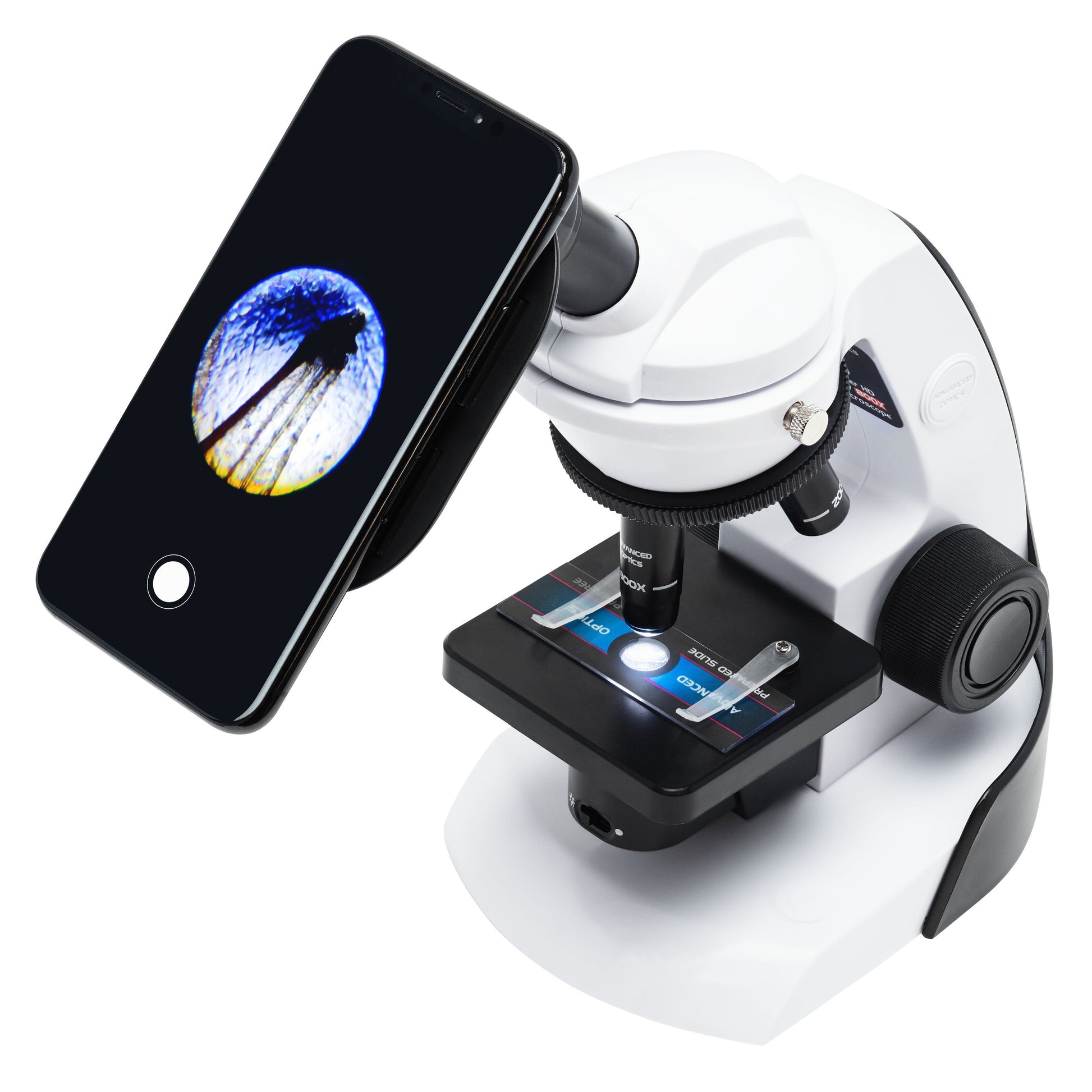 Playknowlogy mikroskop 800x til smartphone, viser forstørrede plantefibre digitalt via okularet.