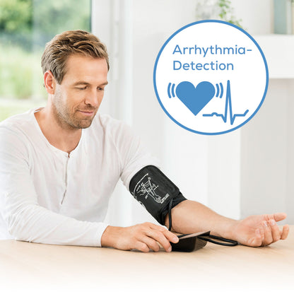 Beurer BM 54 blodtryksmåler til overarm med arytmi-ikon (hjerte og EKG-bølge), Bluetooth-funktion synlig.