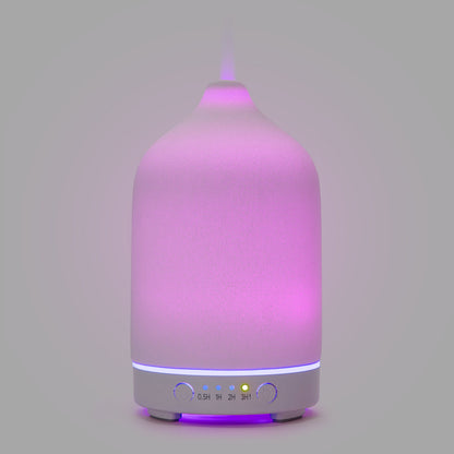 Ultralyd aromadiffuser pink-lilla glød, hvid base, timer (0,5H, 1H, 2H, 3H) og kontrolknapper.
