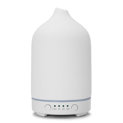 Ultralyd aromadiffuser, afrundet design med let spids top, små kontrolknapper og indikatorlys på frontbasen.