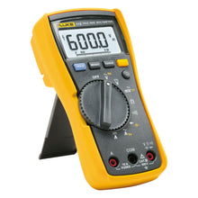Fluke 115 digital multimeter i gul/sort, stor skærm med 600.0 visning, drejeknap og støtteben, True RMS.