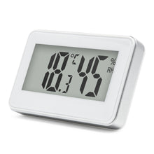 Digitalt termometer og hygrometer til indeklima, måler 18,7°C og 45% luftfugtighed, hvid ramme, klart LCD-display.