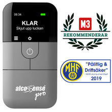 Alcosense For alkoholtester med displaytekst "KLAR Skjut upp luckan" og synlige M3 og MHF testmærker.