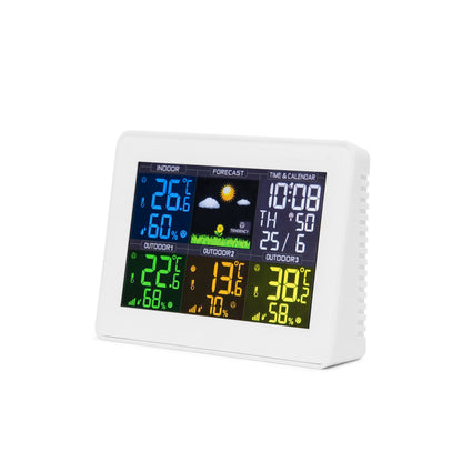 Vejrstation med 4 zoner, farvedisplay viser inde/udendørs temperatur, luftfugtighed, vejrudsigt og dato/tid, hvidt kabinet.