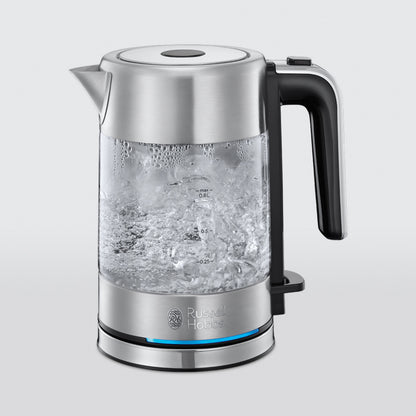 Russell Hobbs elkedel Compact Home i rustfrit stål og glas, sort håndtag, blå indikatorlys, Russell Hobbs-logo.