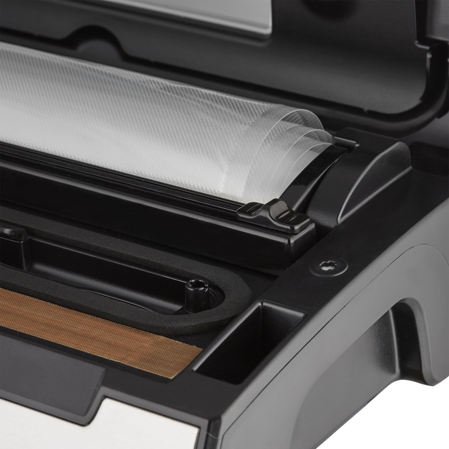 Champion Vakuumpakker Rustfrit i close-up viser plastfolie og forseglingsområde, velegnet til opbevaring og sous vide.