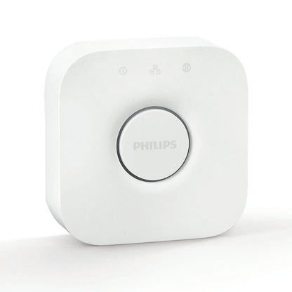 Philips Hue Bridge hvid, kvadratisk med afrundede kanter og central knap til smart home og belysningsstyring.