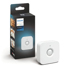 Philips Hue Motion Sensor i mørk æske med logo og Zigbee, kompakt PIR-sensor til indendørs smart belysning.
