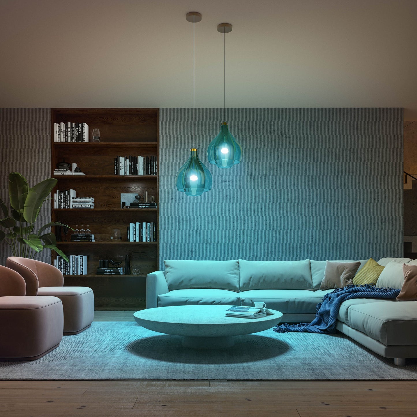 Philips Hue Color Ambiance Startpakke smarte LED-pærer i to blågrønne pendellamper over sofagruppe og bord.