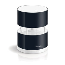 Netatmo Anemometer vindmåler sort/hvid med hul midte, lodrette støtter og Netatmo-logo nederst til Netatmo vejrstation.