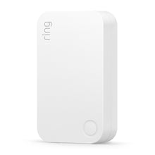 Ring Alarm Rækkevidde Forlænger, afrundet rektangeldesign, Ring logo øverst tv, cirkulær knap nederst th.