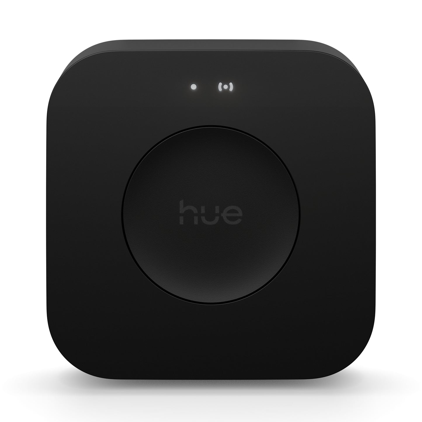 Philips Hue Bridge Pro Broen smart hub sort med afrundede hjørner, rund knap i midten og to små indikatorlys.