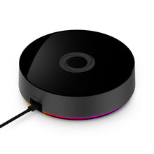 Homey Pro 2023 smart home controller, sort og rund med blank top, cirkulært logo og flerfarvet LED-ring ved basen, Zigbee/Z-Wave/Matter.