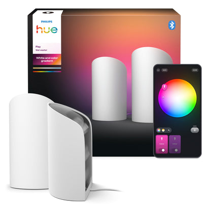 Philips Hue Spil Wall Washer vægbelysning 2-pak hvid med emballage, smartphone viser Hue-appen farvehjul og lysstyrke.