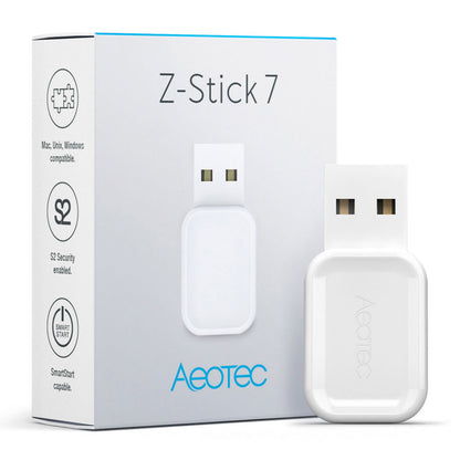Aeotec Z-Stick Gen7 USB-adapter ved siden af æske med modelnavn og kompatibilitetsikoner synlig.