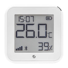 Shelly HT Gen 3 termometer og hygrometer hvid, kvadratisk LCD-display med tid, temperatur, luftfugtighed, batteri og signal.