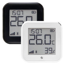 Shelly HT Gen 3 termometer og hygrometer hvid viser tid, temperatur og luftfugtighed.