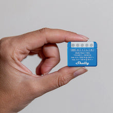 Shelly Wave 1 Mini EU LR Z-Wave modul, kompakt model med elektriske specifikationer synlige på fronten.