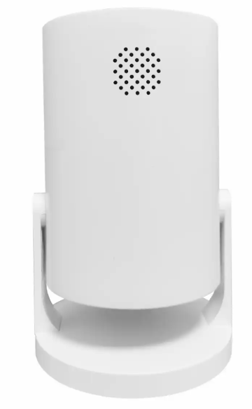 Denver LED projektor, hvid, cylindrisk med rund fod, set bagfra, lille gitter af runde huller øverst.