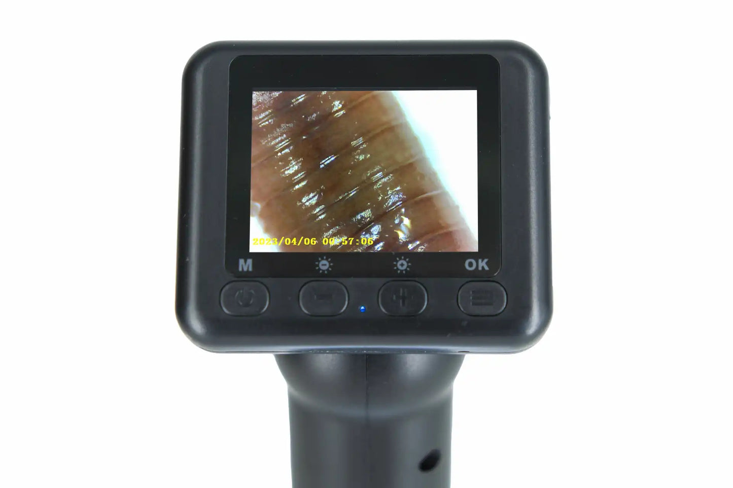 Denver MSC-255 digitalt mikroskop med LCD-skærm, viser overflade, knapper M, venstre, plus, højre og OK under skærmen.
