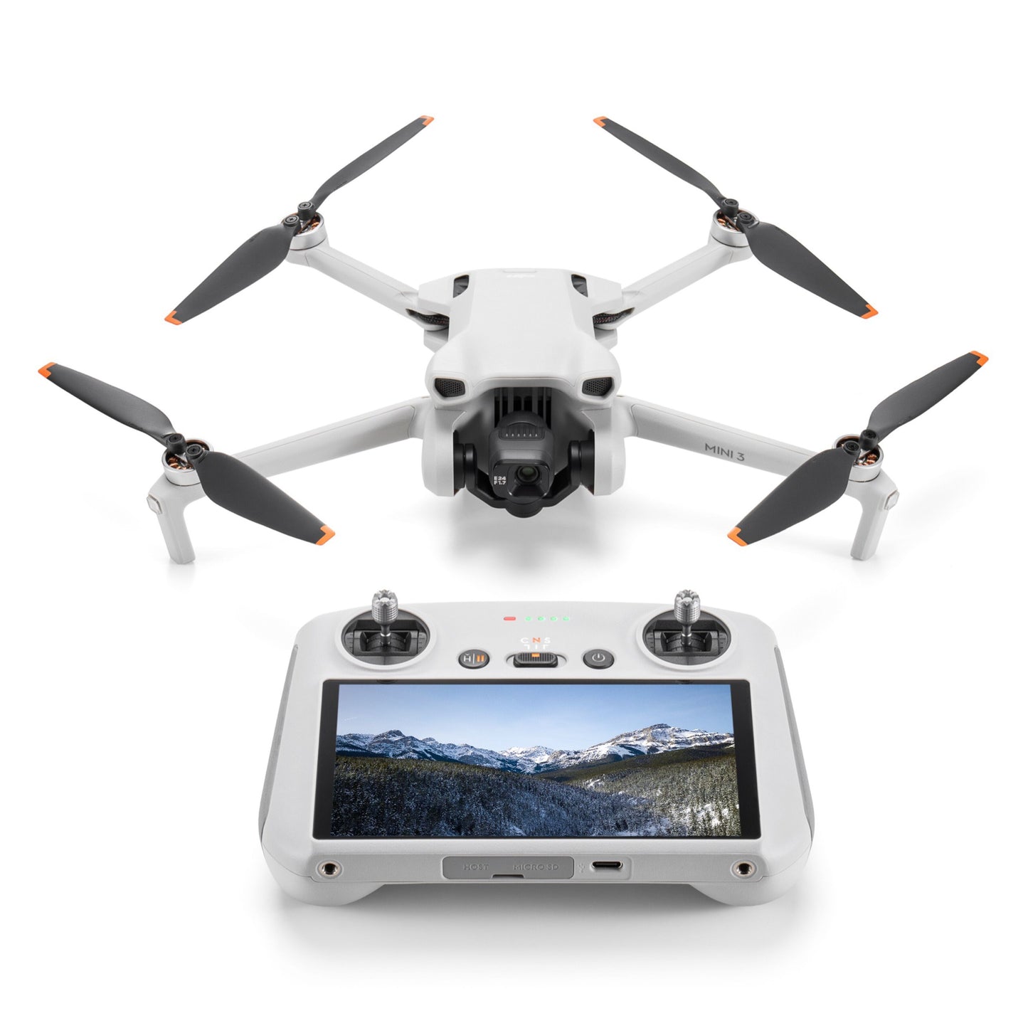 Dji Mini 3 drone hvid med fire propeller bag ved controller, viser bjergscene på skærm, optager i 4K.